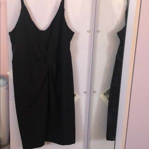 Gorgeous Black Dress with a tie in the front.